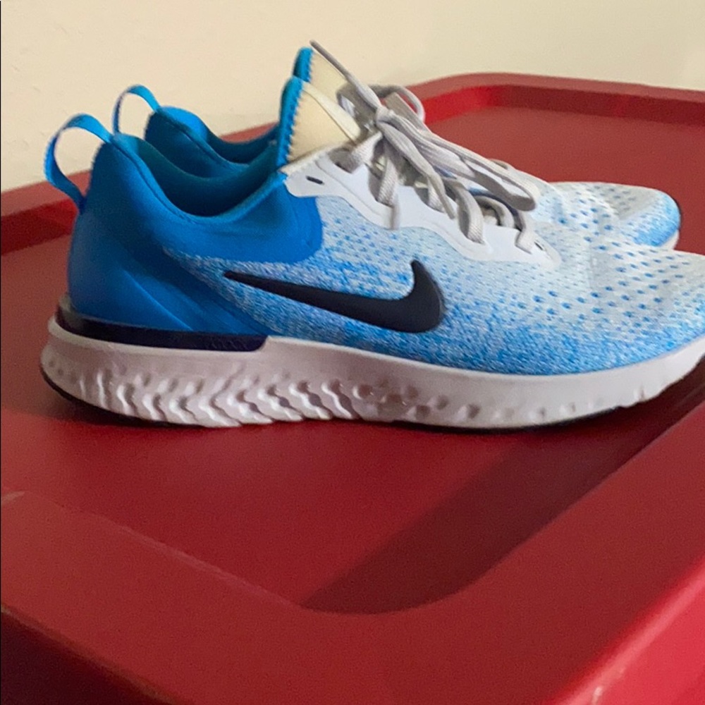 Light blue women’s Nike tennis shoes